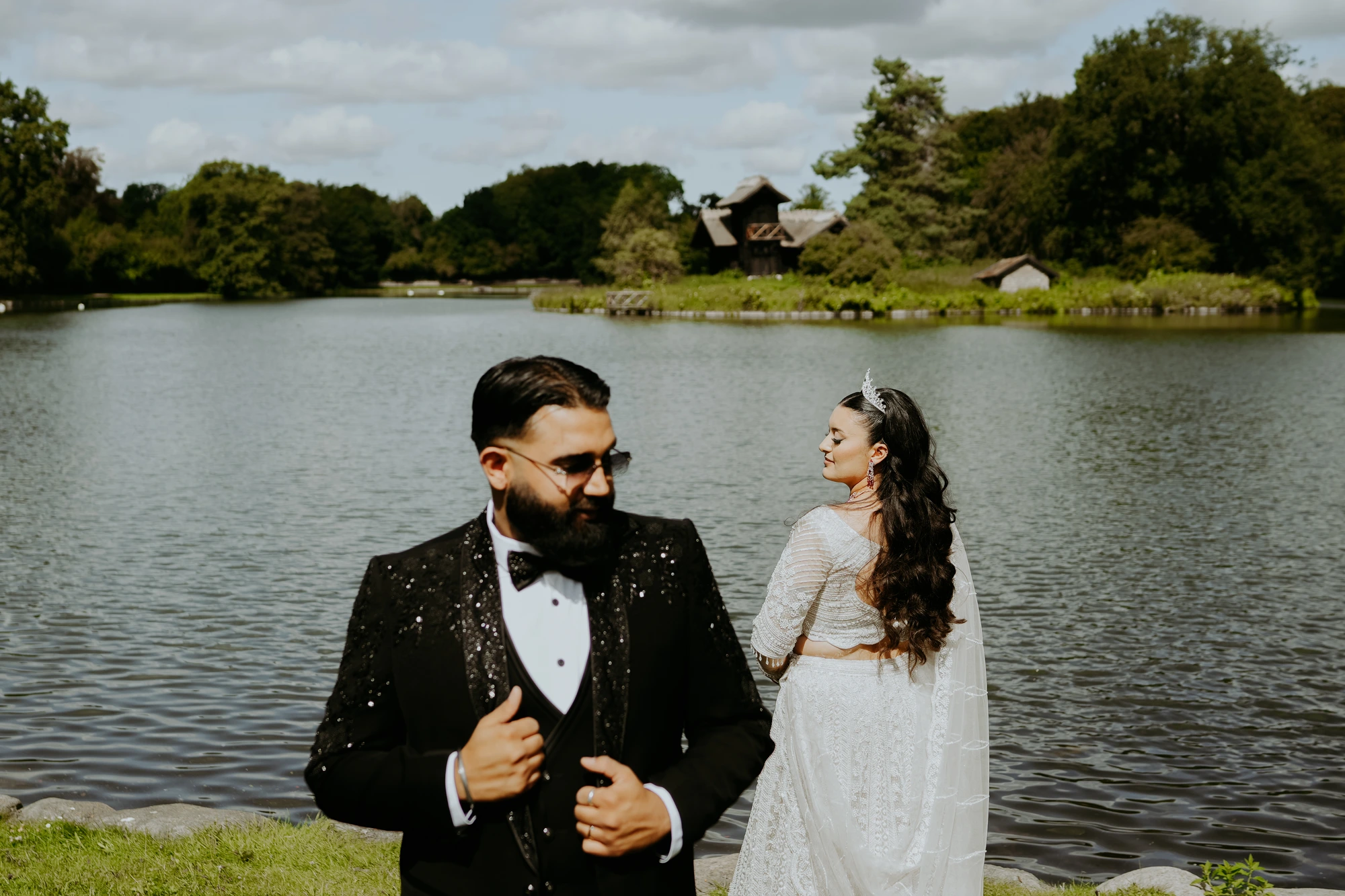 Bride and groom by the water